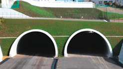 Twin large section tunnels with low-overburden
